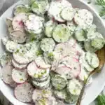 Creamy Cucumber Radish Salad | Amazing Easy Summer Recipe 7 Creamy Cucumber Radish Salad with fresh dill and Greek yogurt dressing in a ceramic bowl