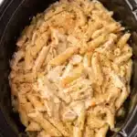 Creamy slow cooker Chicken Pasta Recipe with penne, shredded chicken, and Parmesan sauce