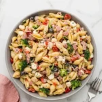 Easy Creamy Pasta Salad with cheddar, crisp vegetables, and creamy dressing.