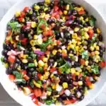 Healthy Corn and Black Bean Salad | Amazing Easy Summer 9 Healthy corn and black bean salad with fresh vegetables in a ceramic bowl
