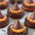Oreo Witch Hat Cookies Recipe | Easy Halloween Party Favorite 7 Oreo Witch Hat Cookies with orange frosting and chocolate kisses