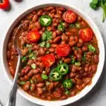 Slow Cooker Pinto Beans Recipe | Amazing Easy Family Dinner 9 Slow Cooker Pinto Beans topped with jalapenos, tomatoes, and cilantro
