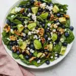 20-Minute Spinach Blueberry Salad with avocado, walnuts, goat cheese, and balsamic dressing