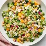 Chopped Broccoli and Chickpea Salad | Amazing Easy Lunch Recipe 11 Chopped Broccoli and Chickpea Salad with tahini dressing, goat cheese, almonds, and fresh vegetables.