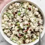 Turkey Salad with cranberries, pecans, celery, fresh herbs, and creamy Dijon dressing