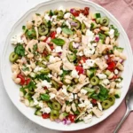 "Healthy Tuscan Tuna Salad with white beans, cucumber, olives, herbs, peppers, and feta",