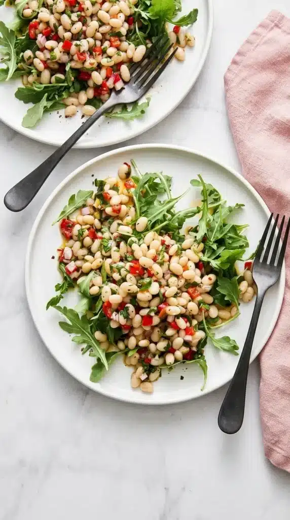Marinated White Beans: Fresh Mediterranean Lunch Recipe 12 Marinated White Beans served over fresh arugula with roasted peppers and herbs