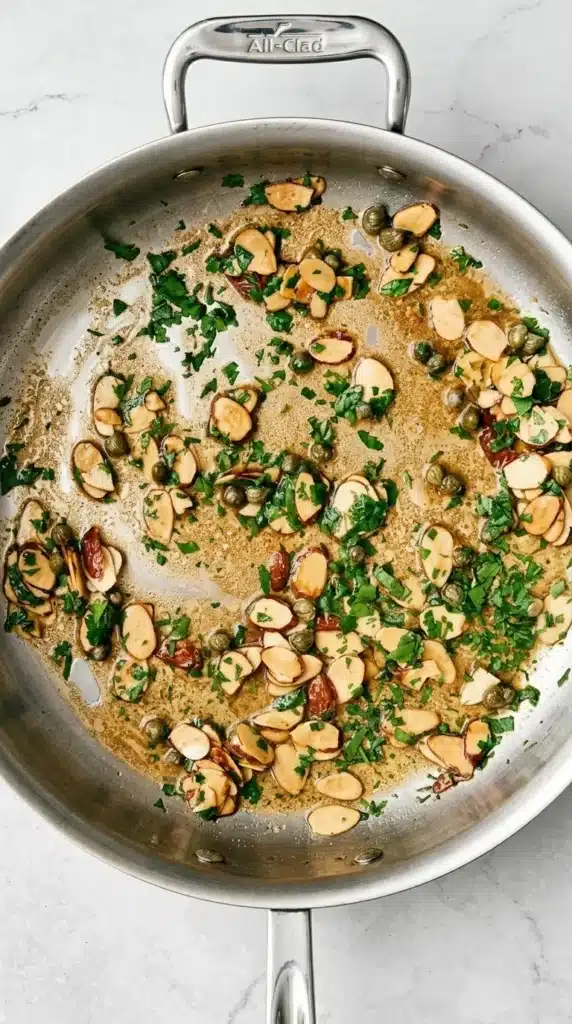 Rainbow Trout Almondine sauce with toasted almonds, capers, parsley, and brown butter