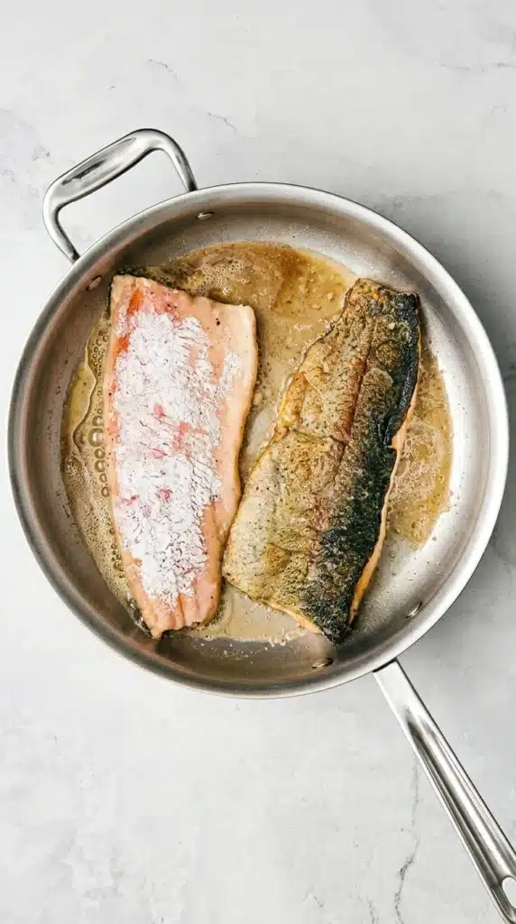 Rainbow Trout Almondine fillets pan searing in butter and olive oil
