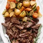 Slow Cooker Pot Roast | Amazing Easy Family Dinner Recipe 11 Slow Cooker Pot Roast with shredded beef, potatoes, carrots, celery, and fresh herbs.