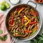 Steak Fajitas Recipe : Amazing Tender and Juicy Dinner 11 Steak fajitas with tender beef, colorful peppers, onions, tortillas, guacamole, and lime