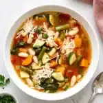 Vegetarian Minestrone Soup with cannellini beans, vegetables, spinach, and Parmesan