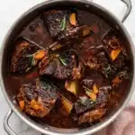Easy Braised Short Ribs Recipe : Ultimate Comfort Feast 9 Braised short ribs with carrots and herbs in a rich beef broth sauce