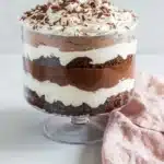 Brownie Trifle layered with fudgy brownies, chocolate pudding, whipped cream, and chocolate shavings
