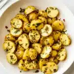 Chimichurri Potato Salad with tender baby potatoes, fresh herbs, garlic, and chili