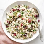 Easy Chicken Salad with grapes, celery, toasted almonds, fresh herbs, and creamy Dijon dressing