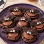Reese’s Oreo Bat Cookies with chocolate cookies, peanut butter cups, Oreo wings, and candy eyes
