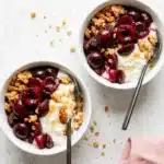 Roasted Cherry Yogurt Bowl with Greek Yogurt and Almonds 7 Roasted Cherry Yogurt Bowl with Greek yogurt, juicy cherries, almonds, coconut, and chia seeds
