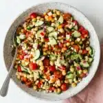 Ultimate Mediterranean Chickpea Salad with feta, cucumber, tomatoes, chickpeas, and fresh parsley