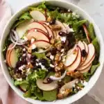 Apple Salad with Candied Walnuts and Cranberries : Easy 11 Apple salad with candied walnuts and cranberries, crisp red apples, fresh greens, feta cheese, and apple cider dressing.