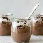 Chocolate Chia Pudding Mousse Recipe : Easy Rich Dessert 7 Chocolate chia pudding mousse in a glass jar topped with whipped cream and chopped nuts