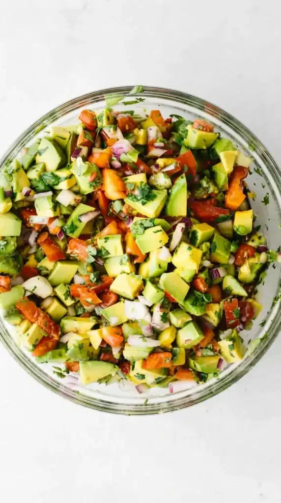 Mixed Avocado Salsa with tomatoes, red onion, jalapeño, and fresh cilantro