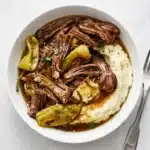 Slow Cooker Mississippi Pot Roast Recipe : Easy & Rich 11 Slow Cooker Mississippi Pot Roast with tender beef, pepperoncini, gravy, and mashed potatoes