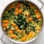 Sweet Potato Stew Recipe : Ultimate Cozy Vegan Comfort 4 Sweet Potato Stew with creamy coconut milk, green lentils, kale, fresh cilantro, and lime in a rustic pot.